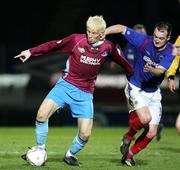 11 April 2006; Paul Mc Arevey, Linfield, in action against Glen Fitzpatrick, Drogheda United. Setanta Cup Semi-Final, Linfield v Drogheda United, Windsor Park, Belfast. Picture credit: Oliver McVeigh / SPORTSFILE