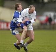 9 April 2006; Glenn Ryan, Kildare, in action against Noel Garvan, Laois. Allianz National Football League, Division 1B, Round 7, Laois v Kildare, O'Moore Park, Portlaoise, Co. Laois. Picture credit: Brian Lawless / SPORTSFILE