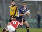 14 April 2006; Guy Easterby, Leinster, is tackled by Clive Stuart-Smith, Llanelli Scarlets. Celtic League 2005-2006, Group A, Leinster v Llanelli Scarlets, Lansdowne Road, Dublin. Picture credit: Matt Browne / SPORTSFILE