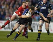 14 April 2006; Gordon D'Arcy, Leinster, is tackled by Ceiron Thomas, Llanelli Scarlets. Celtic League 2005-2006, Group A, Leinster v Llanelli Scarlets, Lansdowne Road, Dublin. Picture credit: Matt Browne / SPORTSFILE