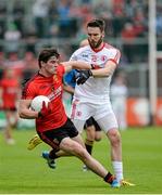 24 May 2014; Niall Madine, Down, in action against Ciaran McGinley, Tyrone. Ulster GAA Football Senior Championship, Preliminary Round Replay, Down v Tyrone, Pairc Esler, Newry, Co. Down. Picture credit: Oliver McVeigh / SPORTSFILE