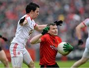 24 May 2014; Daniel McCartan, Down, in action against Mattie Donnelly, Tyrone. Ulster GAA Football Senior Championship, Preliminary Round Replay, Down v Tyrone, Pairc Esler, Newry, Co. Down. Picture credit: Oliver McVeigh / SPORTSFILE