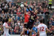 24 May 2014; Niall Madine, Down, in action against Niall Morgan, Tyrone. Ulster GAA Football Senior Championship, Preliminary Round Replay, Down v Tyrone, Pairc Esler, Newry, Co. Down. Picture credit: Oliver McVeigh / SPORTSFILE