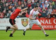24 May 2014; Sean Cavanagh, Tyrone, in action against Conor Maginn, Down. Ulster GAA Football Senior Championship, Preliminary Round Replay, Down v Tyrone, Pairc Esler, Newry, Co. Down. Picture credit: Oliver McVeigh / SPORTSFILE