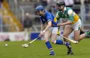 16 April 2006; Ken Dunne, Tipperary, in action against Gary Hanniffy, Offaly. Allianz National Hurling League, Division 1 Quarter-Final, Tipperary v Offaly, Semple Stadium, Thurles, Co. Tipperary. Picture credit: Brian Lawless / SPORTSFILE