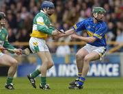 16 April 2006; Declan Fanning, Tipperary, in action against Alan Egan, Offaly. Allianz National Hurling League, Division 1 Quarter-Final, Tipperary v Offaly, Semple Stadium, Thurles, Co. Tipperary. Picture credit: Brian Lawless / SPORTSFILE