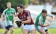 25 May 2014; Fiontan O Curraoin, Galway, in action against Tony Gaughan, London. Connacht GAA Football Senior Championship, Quarter-Final, London v Galway, Emerald Park, Ruislip, London, England. Picture credit: Ray Ryan / SPORTSFILE