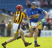 23 April 2006; Paul Kelly, Tipperary, is tackled by Tommy Walsh, Kilkenny. Allianz National Hurling League, Division 1 Semi-Final, Kilkenny v Tipperary, Semple Stadium, Thurles, Co. Tipperary. Picture credit: Ray McManus / SPORTSFILE