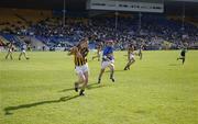 23 April 2006; Michael Kavanagh, Kilkenny, clears under pressure from Diarmaid Fitzgerald, Tipperary. Allianz National Hurling League, Division 1 Semi-Final, Kilkenny v Tipperary, Semple Stadium, Thurles, Co. Tipperary. Picture credit: Ray McManus / SPORTSFILE