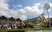 27 April 2006; Jockey Nina Carberry lifts the La Touche Cup after winning the Blue Square Chase aboard Good Step. Punchestown Racecourse, Co. Kildare. Picture credit: Brian Lawless / SPORTSFILE