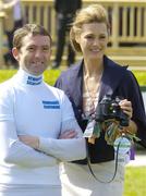 28 April 2006; Jockey Conor O'Dwyer with supermodel Jasmin Le Bon before the start of the days racing. Punchestown Racecourse, Co. Kildare. Picture credit: Pat Murphy / SPORTSFILE