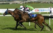 28 April 2006; Olney Lad, with Jimmy McCarthy up, races clear of Wolf Creek, with Paddy Flood up, 7, on their way to winning the betfair.com Novice Handicap Steeplechase. Punchestown Racecourse, Co. Kildare. Picture credit: Pat Murphy / SPORTSFILE