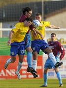 28 April 2006; Jason Gavin, Drogheda United, in action against, Davy Byrne, left, and Andy Myler, Longford Town. eircom League, Premier Division, Drogheda United v Longford Town, United Park, Drogheda, Co. Louth. Picture credit: Brian Lawless / SPORTSFILE