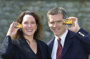 24 April 2006; Details of the GOLFnet Charity Challenge 2006, sponsored by Bulmers, were announced today. At the announcement are Orlaith Fortune, Senior Brand Manager, Bulmers, and Conor Mallaghan, Captain, Carton House Golf Club, displaying GOLFnet Member cards. The Bulmers GOLFnet Charity Challenge is an official Golfing Union Ireland event, and as such all golf clubs affiliated to the GUI are eligible to participate, opening the competition up to over 200,000 members of 415 affiliated clubs. GUI Headquarters, Carton House, Maynooth, Co. Kildare. Picture credit: Brian Lawless / SPORTSFILE