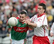 23 April 2006; Marcus Hannick, Mayo, in action against Niall Kerr, Tyrone. Cadbury's All-Ireland U21 Football Championship Semi-Final, Mayo v Tyrone, Kingspan Breffni Park, Cavan. Picture credit: Oliver McVeigh / SPORTSFILE