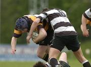 29 April 2006; Paudie McMahon, Young Munster, is tackled by Chris Kennedy, Old Belvedere. AIB League, Division 2. Young Munster v Old Belvedere, Anglesea Road, Dublin. Picture credit: David Levingstone / SPORTSFILE