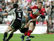 5 May 2006; Trevor Halstead, Munster, is tackled by Andrew Lloyd, Ospreys. Celtic League, Ospreys v Munster, Liberty Stadium, Swansea, Wales. Picture credit; Steve Pope / SPORTSFILE