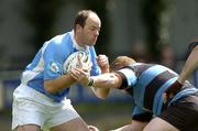 5 May 2006; Conor Kilroy, Garryowen, is tackled by Gary McNamara, Shannon. AIB League 2005-2006, Semi-Final, Garryowen v Shannon. Dooradoyle, Co. Limerick. Picture credit: Matt Browne / SPORTSFILE