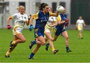 3 May 2014; Sinéad Kenny, Roscommon, in action against Áine Tubridy, Antrim. TESCO Ladies National Football League Division 4 Final, Antrim v Roscommon, O'Connor Park, Tullamore, Co. Offaly. Picture credit: Ray McManus / SPORTSFILE