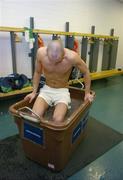 2 May 2006; There was an extraordinary atmosphere in Croke Park today as Bank of Ireland launched the 2006 Football Championship. This year marks the thirteenth year of Bank of Ireland’s sponsorship of this great event. Pictured at the launch is model Yannis, with his reaction of getting into an Ice Bath, favoured by many teams as a way of physical recovery after a game. Picture credit: Brendan Moran / SPORTSFILE