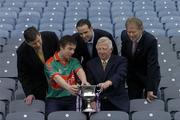 4 May 2006; Mayo U21 player Alan Joyce with Cork U21 selector Mick O'Loughlin, front right, Cathal O'Connor, Marketing Manager, Cadbury Ireland, left, Kildare footballer Dermot Earley, centre, a Judge of Cadbury Hero of the Future, and GAA broadcaster Micheal O Muircheartaigh at a photocall ahead of the Cadbury U21 All-Ireland Football Final between Cork and Mayo on Sunday next.  Croke Park, Dublin. Picture credit: Brian Lawless / SPORTSFILE