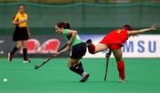 4 May 2006; Katherine Elkin, Ireland, in action against China. Ireland were defeated 6-0 and play New Zealand in the 7th/8th place play-off tomorrow. Samsung Women's Hockey World Cup Qualifier, Ireland v China, Rome, Italy. Picture credit: SPORTSFILE