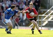 7 May 2006; Brendan Coulter, Down, in action against Michael Hannon, Cavan. Bank of Ireland Ulster Football Championship, Preliminary Round, Down v Cavan, Casement Park, Belfast, Co Antrim. Picture credit; Matt Browne / SPORTSFILE