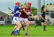 1 June 2014; John A Delaney, Laois, in action against Joe Canning, Galway. Leinster GAA Hurling Senior Championship, Quarter-Final, Galway v Laois, O'Moore Park, Portlaoise, Co. Laois. Picture Credit: Tomás Greally / SPORTSFILE