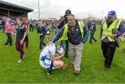 1 June 2014; The Laois goalkeeper Eoin Reilly is consoled after the final whistle. Leinster GAA Hurling Senior Championship, Quarter-Final, Galway v Laois, O'Moore Park, Portlaoise, Co. Laois. Picture credit: Matt Browne / SPORTSFILE