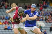 1 June 2014; Ronan Burke, Galway, in action against Stephen Maher, Laois. Leinster GAA Hurling Senior Championship, Quarter-Final, Galway v Laois, O'Moore Park, Portlaoise, Co. Laois. Picture Credit: Tomás Greally/ SPORTSFILE