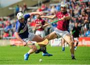 1 June 2014; Neil Foyle, Laois, in action against Daithí Burke, Galway. Leinster GAA Hurling Senior Championship, Quarter-Final, Galway v Laois, O'Moore Park, Portlaoise, Co. Laois. Picture Credit: Tomás Greally / SPORTSFILE