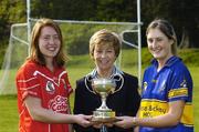 11 May 2006; The National Camogie League Division 1 Final between Cork and Tipperary takes place immediately following the Munster Hurling Championship clash between Limerick and Tipperary in Semple Stadium on Sunday next. Pictured at a photocall ahead of Sunday's game are, from left, Rena Buckley, Cork, Liz Howard, President, Cumann Camogaoiochta na nGael, and Julie Kirwan, Tipperary. Picture credit: David Maher / SPORTSFILE