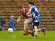 14 May 2006; Kyle Carragher, Armagh, is tackled by Darren Duffy, Monaghan. ESB Ulster Minor Football Championship, Armagh v Monaghan, St. Tighernach's Park, Clones, Co. Monaghan. Picture credit; Damien Eagers / SPORTSFILE