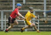 14 May 2006; Patrick Doherty, Antrim, in action against Michael McCartan, Down. Ulster Minor Hurling Championship, Antrim v Down, Casement Park, Belfast. Picture credit; Pat Murphy / SPORTSFILE