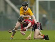 14 May 2006; Paul Branniff, Down, is tackled by Martin Scullion, Antrim. Guinness Ulster Senior Hurling Championship Semi-Final, Down v Antrim, Casement Park, Belfast. Picture credit; Pat Murphy / SPORTSFILE