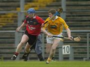 14 May 2006; James Coyle, Down, is tackled by Barry McFall, Antrim. Guinness Ulster Senior Hurling Championship Semi-Final, Down v Antrim, Casement Park, Belfast. Picture credit; Pat Murphy / SPORTSFILE