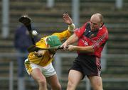 14 May 2006; Gary Savage, Down, is tackled by Brian McFall, Antrim. Guinness Ulster Senior Hurling Championship Semi-Final, Down v Antrim, Casement Park, Belfast. Picture credit; Pat Murphy / SPORTSFILE