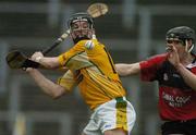 14 May 2006; Michael Herron, Antrim, is tackled by Stephen Murray, Down. Guinness Ulster Senior Hurling Championship Semi-Final, Down v Antrim, Casement Park, Belfast. Picture credit; Pat Murphy / SPORTSFILE