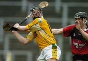14 May 2006; Michael Herron, Antrim, is tackled by Stephen Murray, Down. Guinness Ulster Senior Hurling Championship Semi-Final, Down v Antrim, Casement Park, Belfast. Picture credit; Pat Murphy / SPORTSFILE