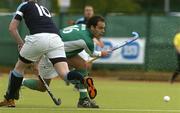 14 May 2006; Stephen Butler, Glenanne, in action against Eroll Lutton, Lisnagarvey. The Men's 2006 Club Championships, Lisnagarvey v Glenanne, National Hockey Stadium, UCD, Belfield, Dublin. Picture credit: Ciara Lyster / SPORTSFILE