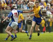 14 May 2006; Stephen Lohan, Roscommon, in action against Sean Munnelly, New York. Bank of Ireland Connacht Football Championship, New York v Roscommon, Gaelic Park, The Bronx, New York, USA. Picture credit: Brendan Moran / SPORTSFILE