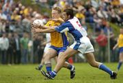 14 May 2006; Richard Dooner, Roscommon, in action against Cathal McKeever, New York. Bank of Ireland Connacht Football Championship, New York v Roscommon, Gaelic Park, The Bronx, New York, USA. Picture credit: Brendan Moran / SPORTSFILE