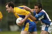 14 May 2006; Enda Kenny, Roscommon, in action against Cathal McKeever, New York. Bank of Ireland Connacht Football Championship, New York v Roscommon, Gaelic Park, The Bronx, New York, USA. Picture credit: Brendan Moran / SPORTSFILE