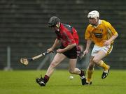 14 May 2006; Stephen Murray, Down, is tackled by Joseph Scullion, Antrim. Guinness Ulster Senior Hurling Championship Semi-Final, Down v Antrim, Casement Park, Belfast. Picture credit; Pat Murphy / SPORTSFILE