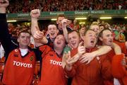 20 May 2006; Munster fans, including John Kenny, second from right, celebrate after the match. Heineken Cup final, Munster v Biarritz Olympique, Millennium Stadium, Cardiff, Wales. Picture credit; Brian Lawless / SPORTSFILE