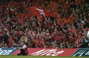 20 May 2006; Munster fans cheer on their side during the game. Heineken Cup Final, Munster v Biarritz Olympique, Millennium Stadium, Cardiff, Wales. Picture credit; Brendan Moran / SPORTSFILE