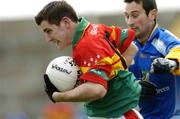 21 May 2006; Ciaran Pender, Carlow, is tackled by Ciaran Hyland, Wicklow. Bank of Ireland Leinster Senior Football Championship, Round 1, Wicklow v Carlow, Wexford Park, Co. Wexford. Picture credit; Matt Browne / SPORTSFILE