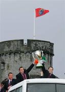 21 May 2006; Rob Henderson and Marcus Horan lift the Heineken Cup as they arrive for the Munster victory parade at King John's Castle, Limerick. Picture credit; Kieran Clancy / SPORTSFILE