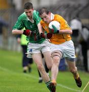 21 May 2006; Eoin Donnelly, Fermanagh, in action against Sean O'Neill, Antrim. ESB Ulster Minor Football Championship, Round 1, Fermanagh v Antrim, Brewster Park, Enniskillen, Co. Fermanagh. Picture credit; Oliver McVeigh / SPORTSFILE