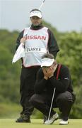 22 May 2006; Darren Clarke, Northern Ireland, with his caddy Billy Foster on the 18th green where he had a bogey 6 to finish third. Nissan Irish Open Golf Championship, Carton House Golf Club, Maynooth, Co. Kildare. Picture credit; Brendan Moran / SPORTSFILE